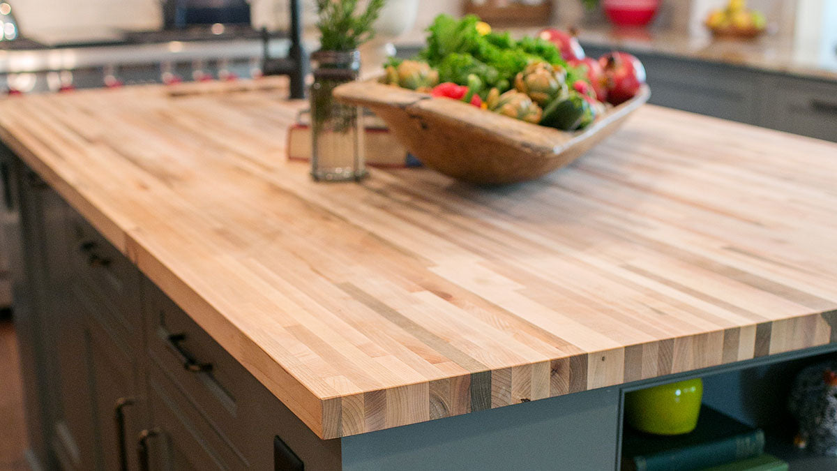 Maple butcher block island with veggie bowl